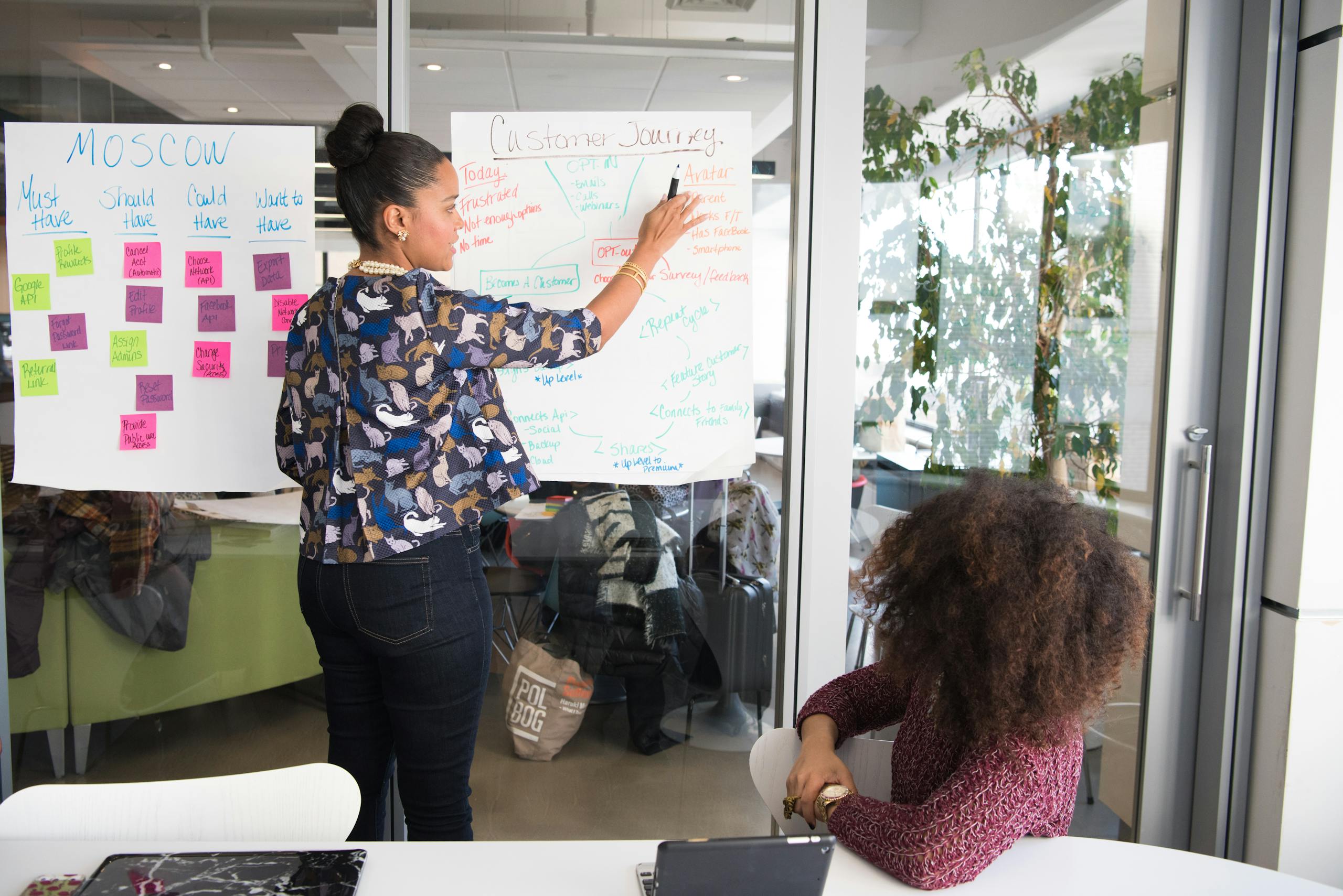 Join Our Team of Social Auditors 2 Two Women Having a Meeting Inside Glass-panel Office